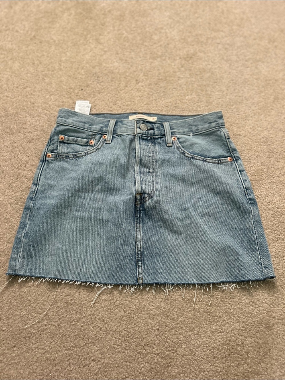 Size 27 Levis ICON light wash denim skirt with raw hem
